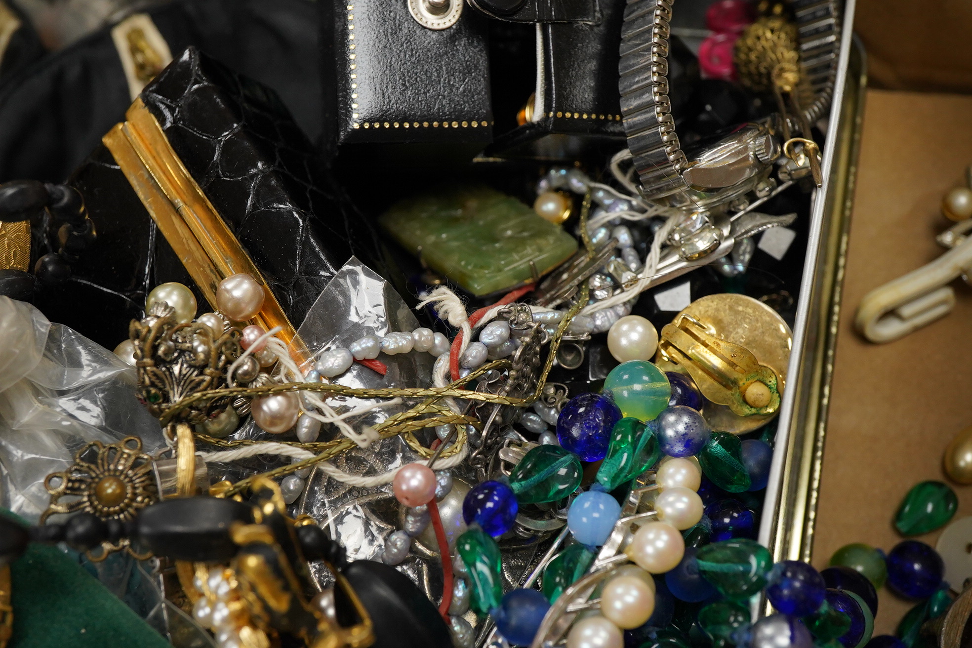 A quantity of assorted mainly costume jewellery, including paste brooch, facetted jet bead necklace, enamelled earrings, wrist watches, compact, lighters, etc.